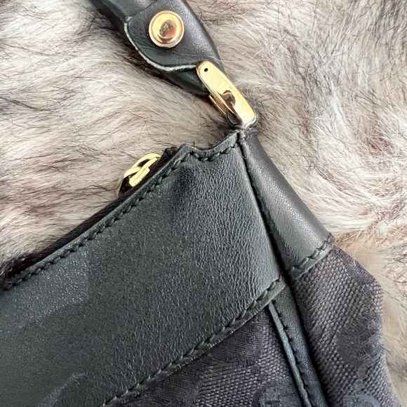 Gucci black canvas monogram hobo bag with gold buckle. Comes with a duster bag. - Picture 4 of 12
